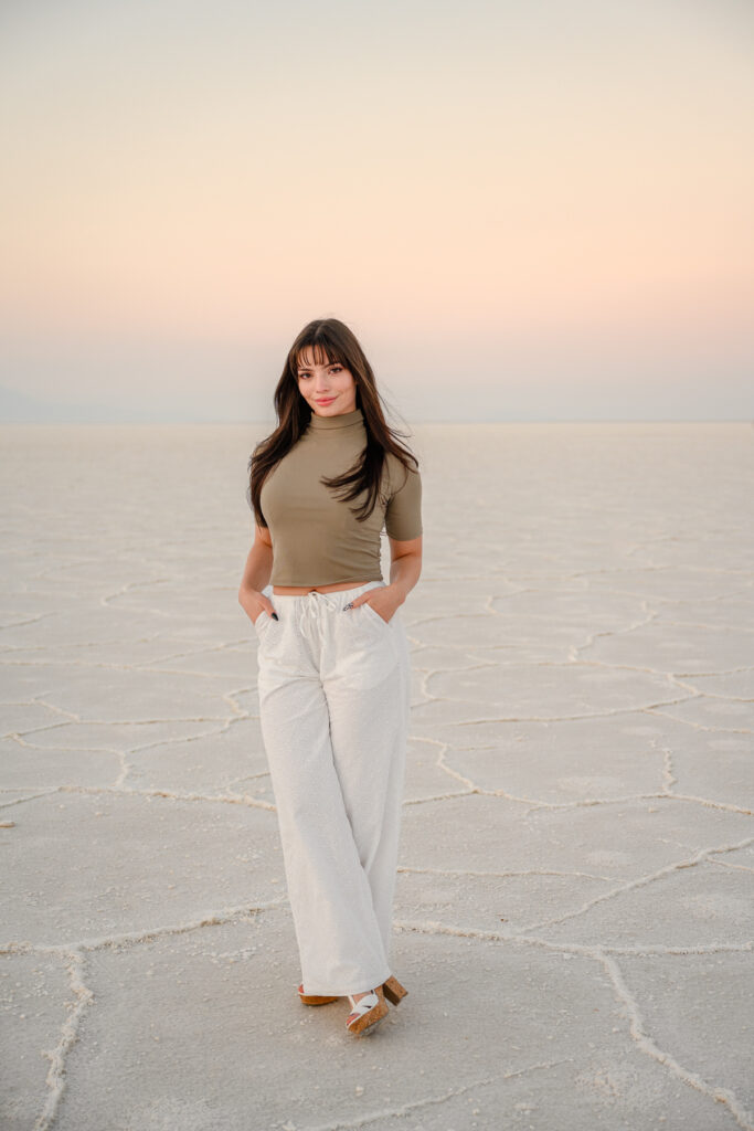 Senior photos at Bonneville Salt Flats during sunset
