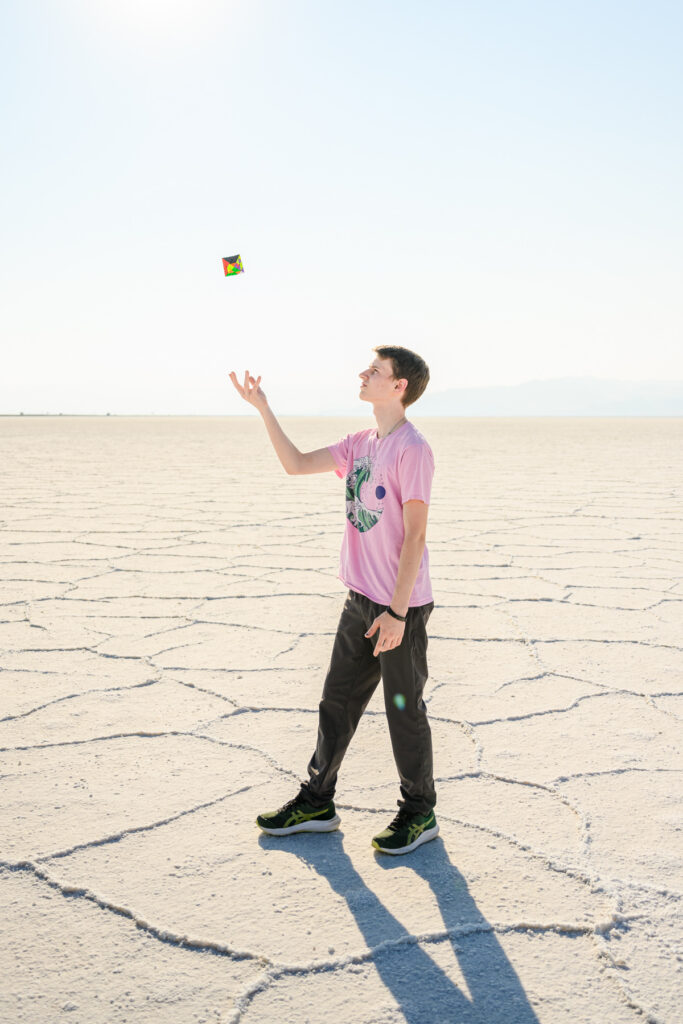 Senior photos at Bonneville Salt Flats during sunset
