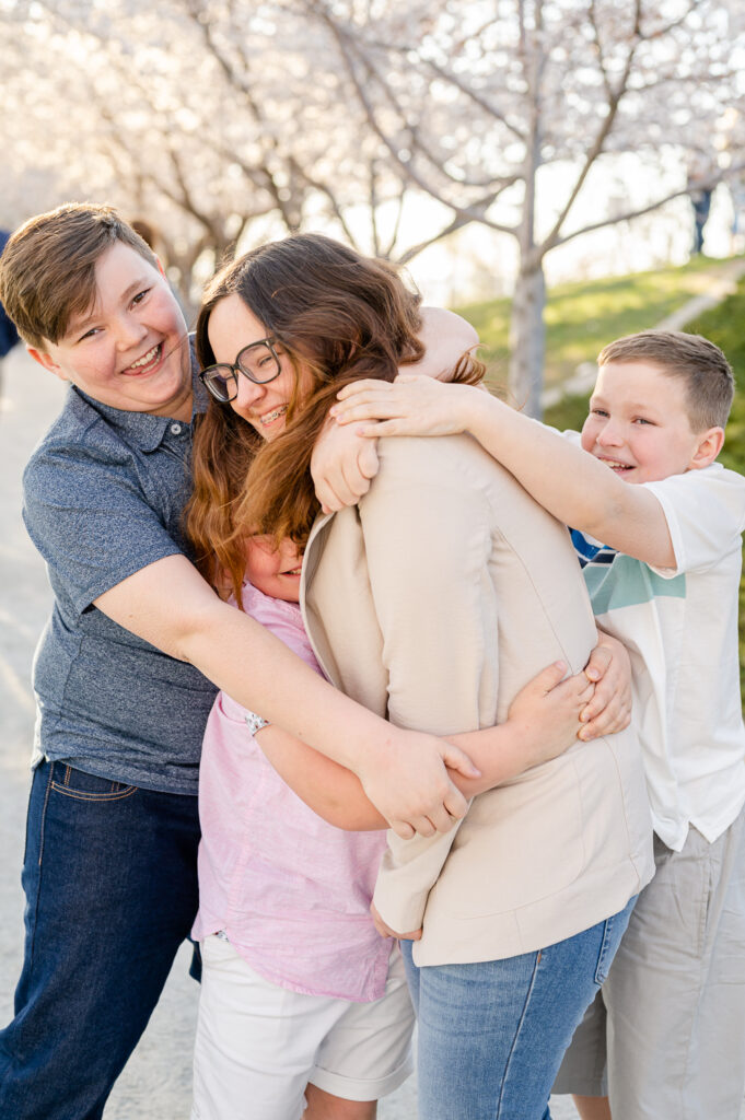 kids being candid at Utah state capitol blossoms spring family photos by a utah family photographer