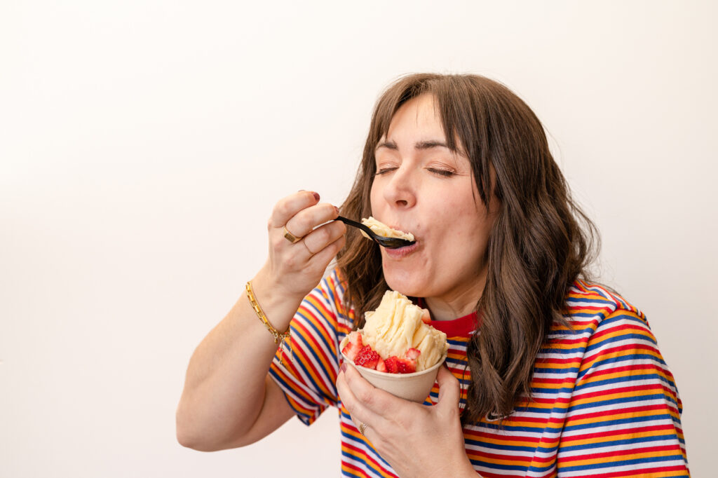 dessert collective food photography of woman eating ice cream taken by a food photographer in utah 