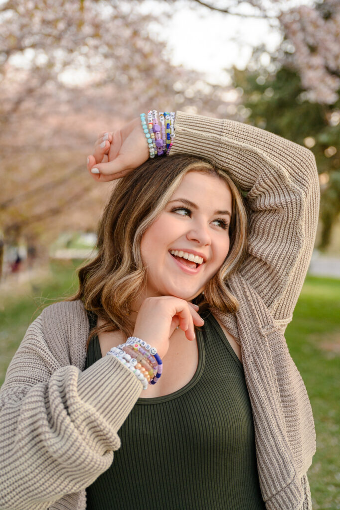 • Senior portrait with soft pink blossoms at Salt Lake City Capitol grounds