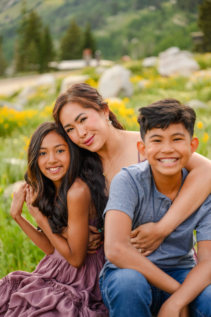 Family photo session in a Utah field during summer