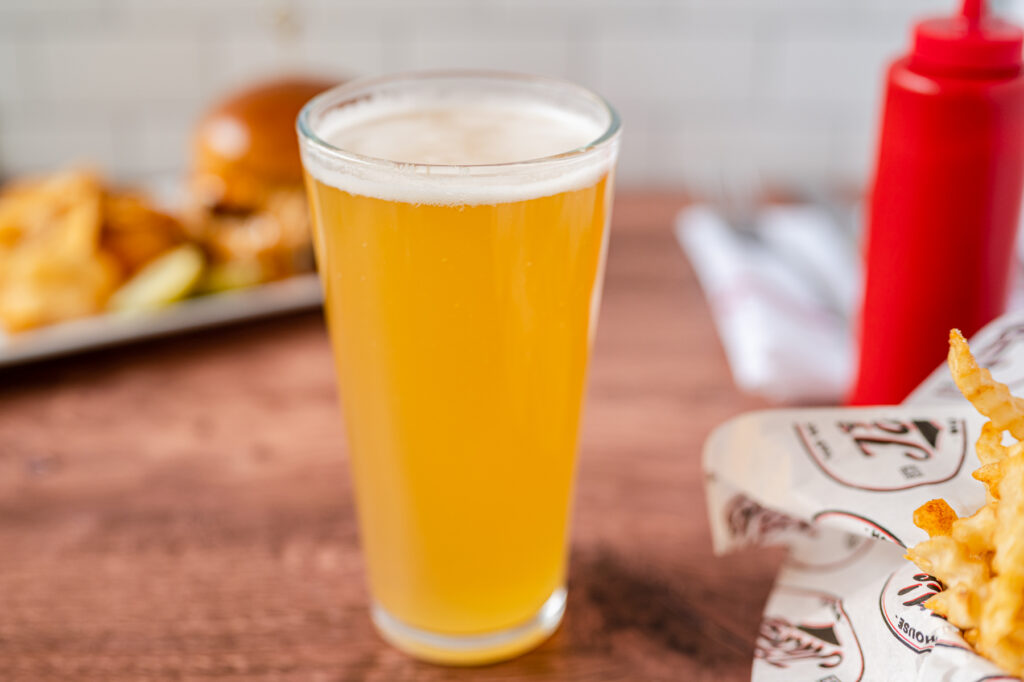Bar staff preparing signature cocktails for marketing photos
