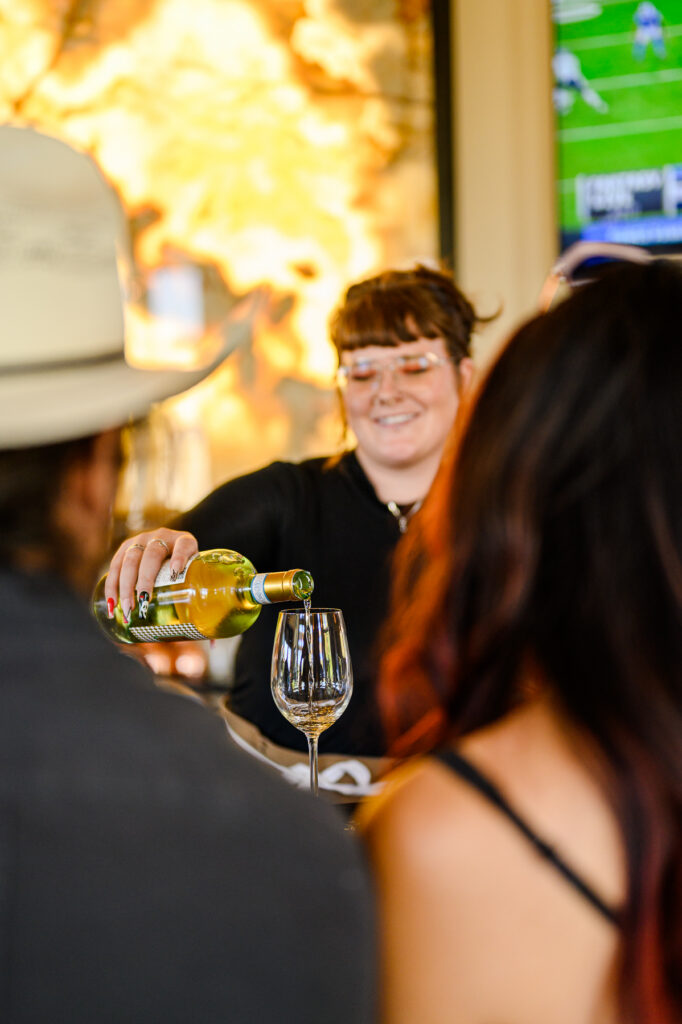 Bar staff preparing signature cocktails for marketing photos